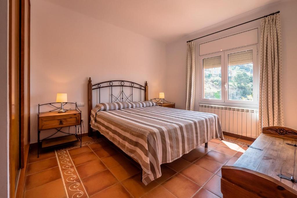 Postel nebo postele na pokoji v ubytování B-47 BEGUR 8PaX