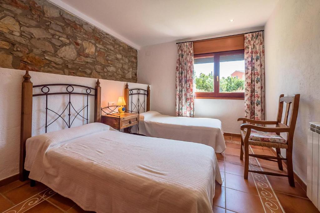 Postel nebo postele na pokoji v ubytování B-47 BEGUR 8PaX