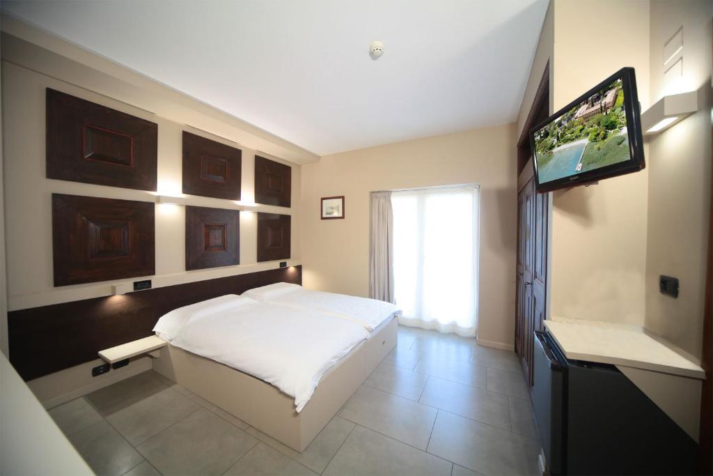 Postel nebo postele na pokoji v ubytování Hotel La Paül