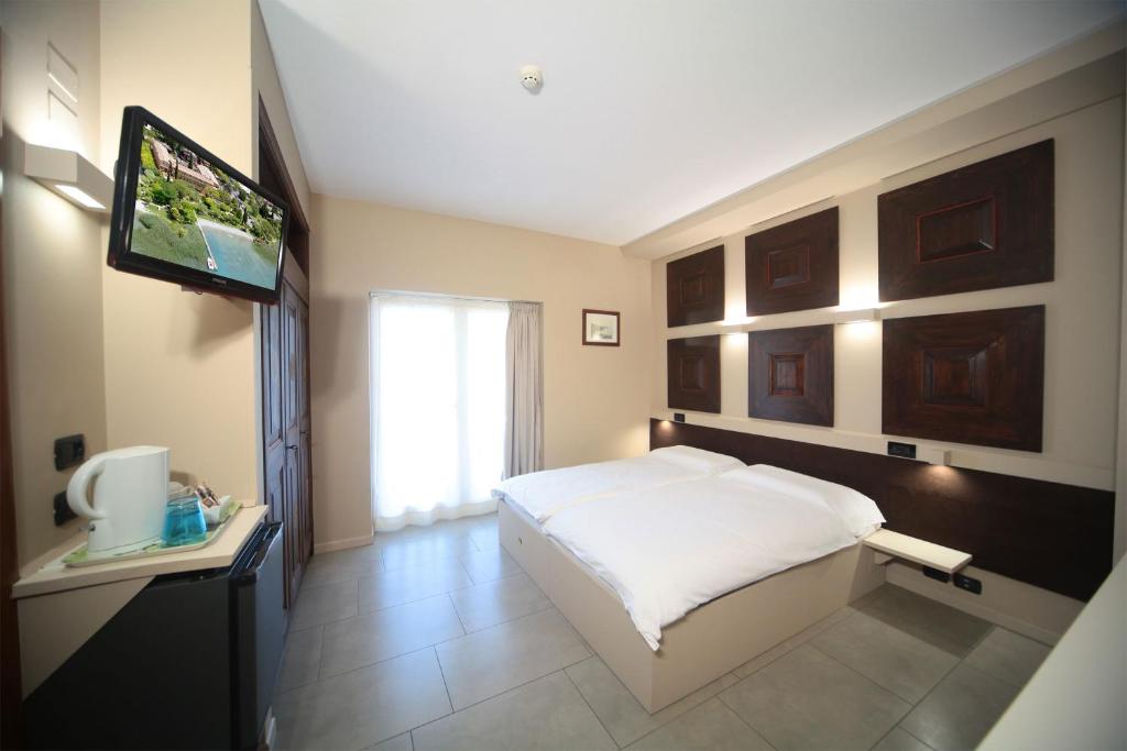 Postel nebo postele na pokoji v ubytování Hotel La Paül