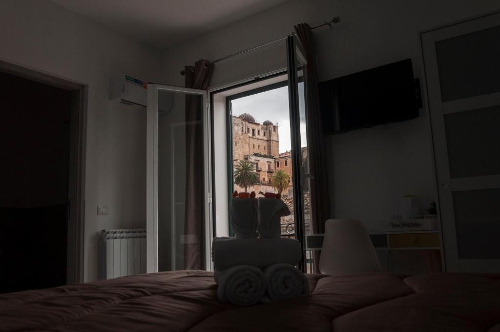 TV a/nebo společenská místnost v ubytování La Piccola Formica Charme Rooms