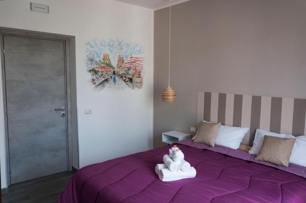 Postel nebo postele na pokoji v ubytování La Piccola Formica Charme Rooms