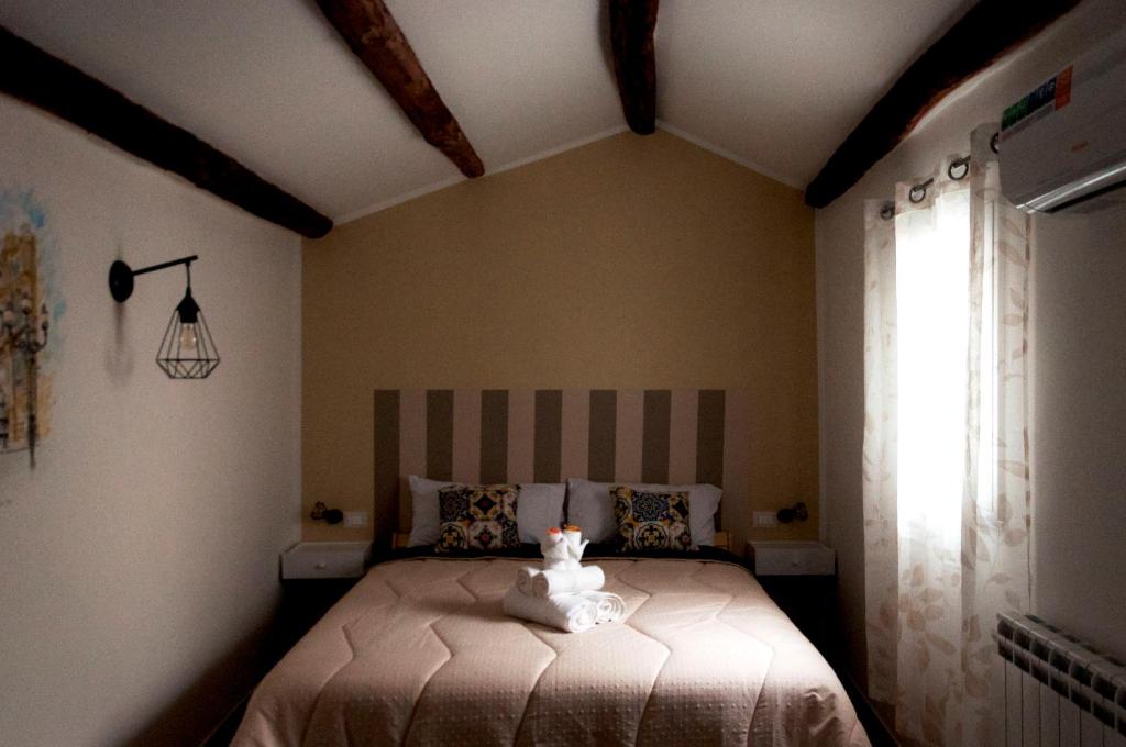 Postel nebo postele na pokoji v ubytování La Piccola Formica Charme Rooms