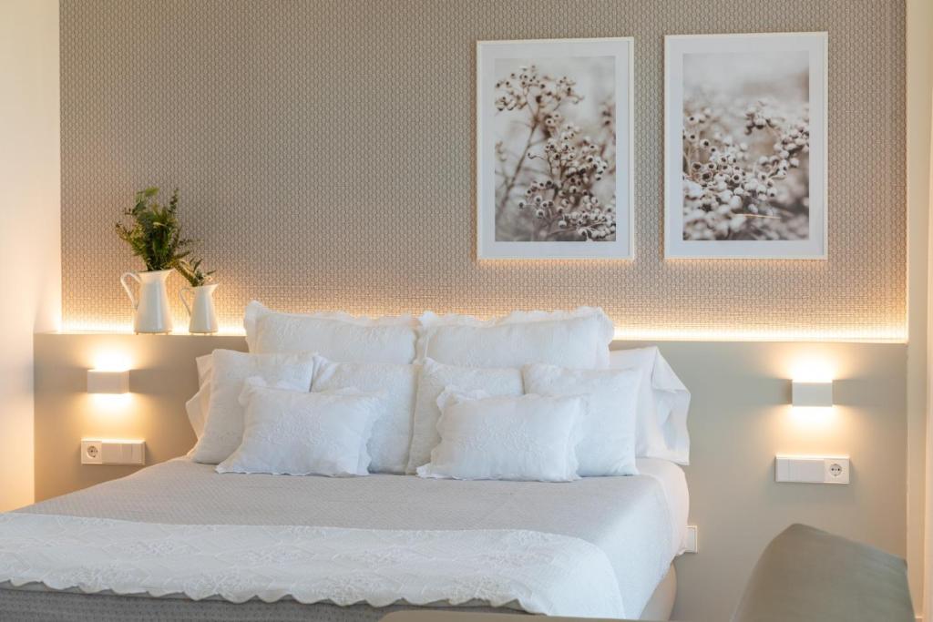 Postel nebo postele na pokoji v ubytování Hotel Rural Tierras del Cid