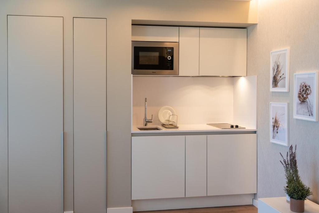 Kuchyň nebo kuchyňský kout v ubytování Hotel Rural Tierras del Cid