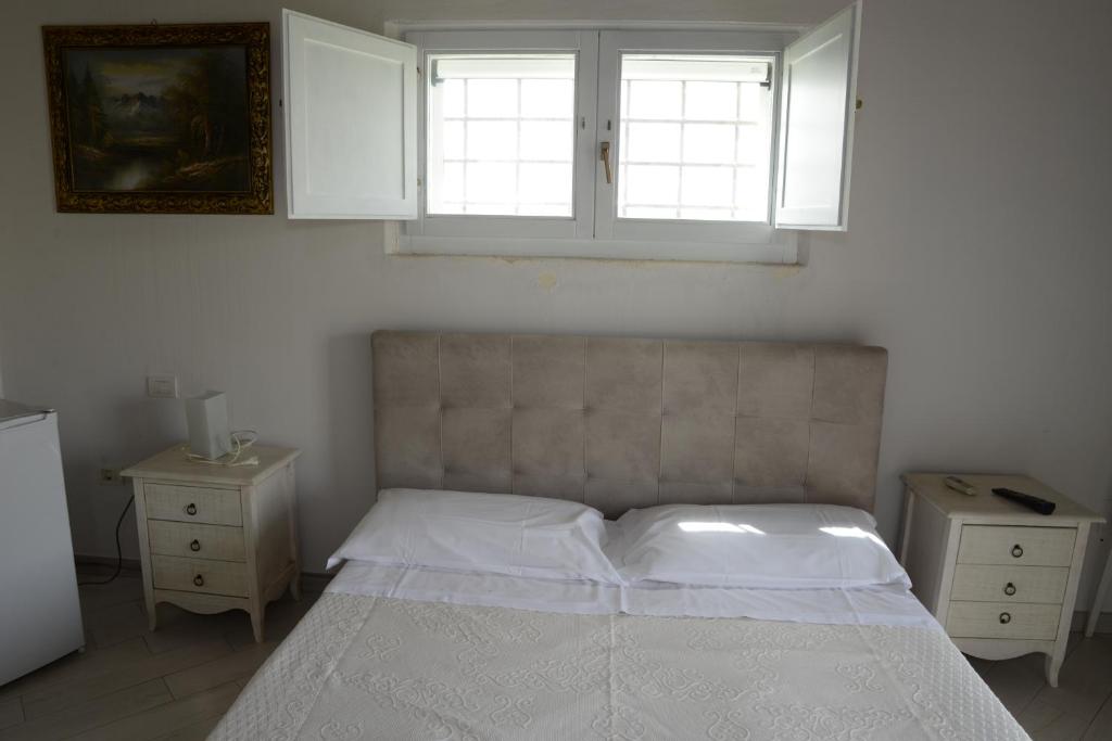 Posteľ alebo postele v izbe v ubytovaní Hotel Ristorante Termitito