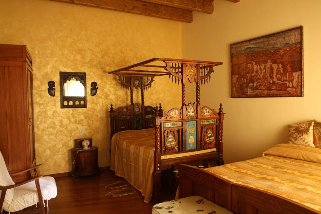 A bed or beds in a room at Bed and Breakfast Angolo Fiorito