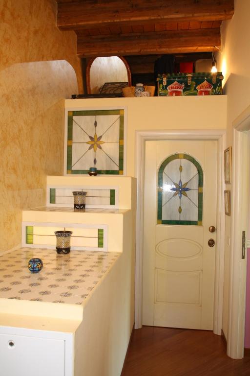 A kitchen or kitchenette at Bed and Breakfast Angolo Fiorito