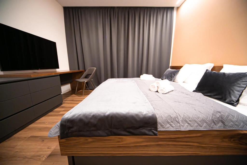 Łóżko lub łóżka w pokoju w obiekcie Villa Estate