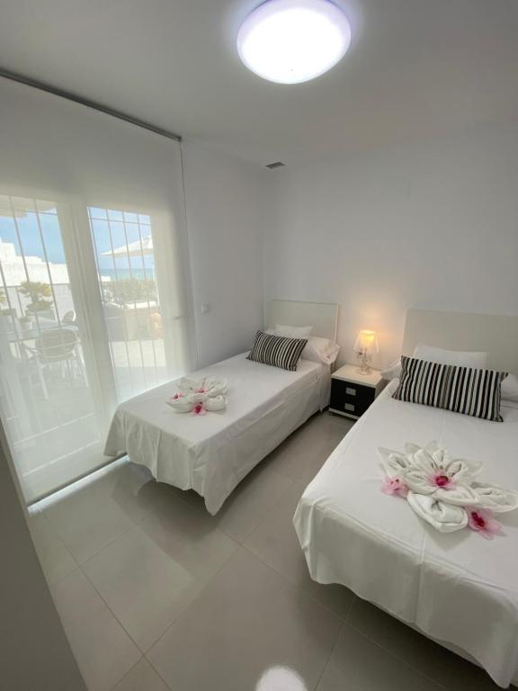 Postel nebo postele na pokoji v ubytování Ocean View Apartment