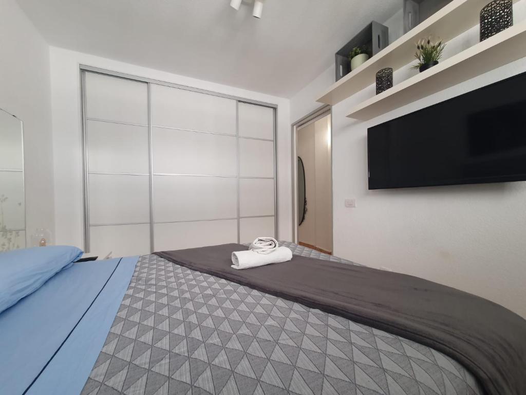 Posteľ alebo postele v izbe v ubytovaní Surycan, beautiful apartment in maspalomas