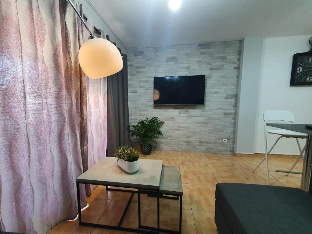 Televízia a/alebo spoločenská miestnosť v ubytovaní Surycan, beautiful apartment in maspalomas