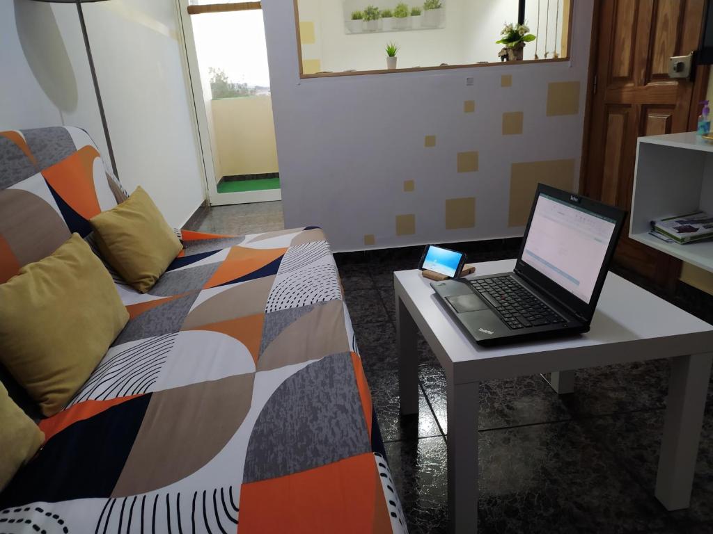 TV a/nebo společenská místnost v ubytování Burrero Beach Stay - Sunshine