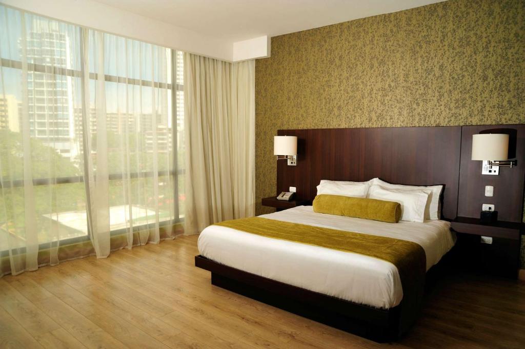 Postel nebo postele na pokoji v ubytování Best Western Plus Panama Zen Hotel