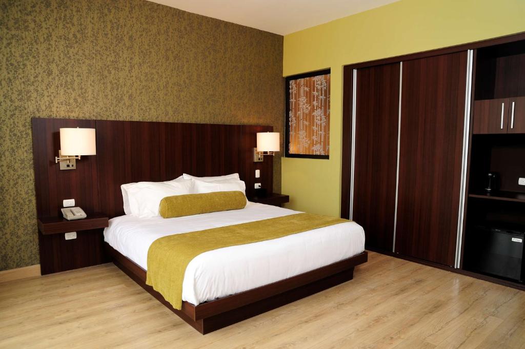 Postel nebo postele na pokoji v ubytování Best Western Plus Panama Zen Hotel