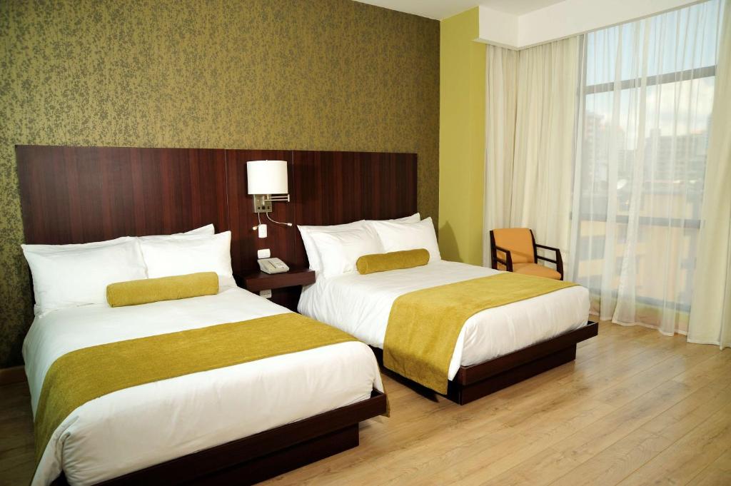 Postel nebo postele na pokoji v ubytování Best Western Plus Panama Zen Hotel