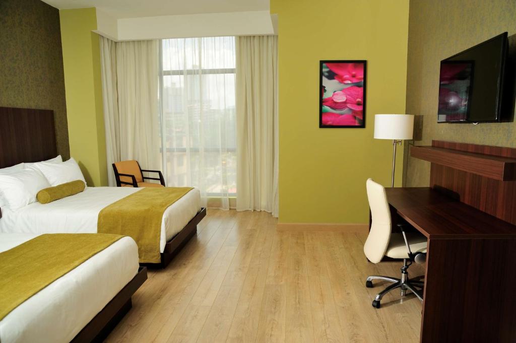TV a/nebo společenská místnost v ubytování Best Western Plus Panama Zen Hotel
