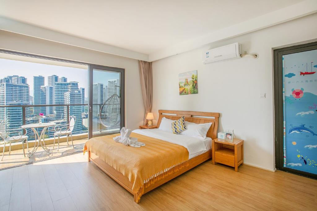 Postel nebo postele na pokoji v ubytování HuiZhou HuaYangNian Seaview Guesthouse