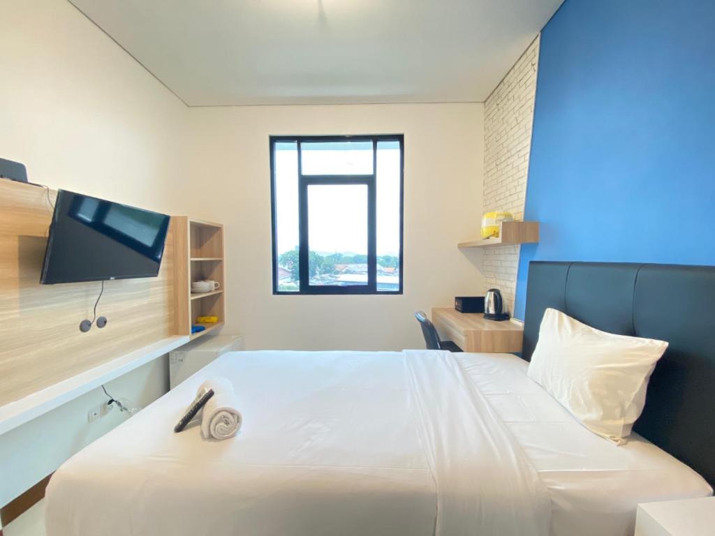 Comfortable Studio Semi Apartment at The Lodge Paskal near BINUS University By Travelio - Studio-appartement