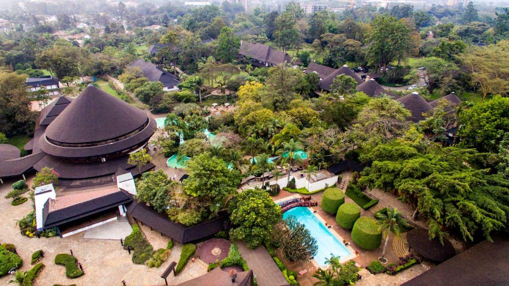 an aerial view of a house with a swimming pool at Safari Park Hotel in Nairobi
