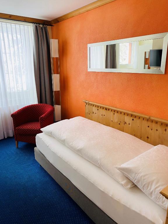 Postel nebo postele na pokoji v ubytování Hotel Maria