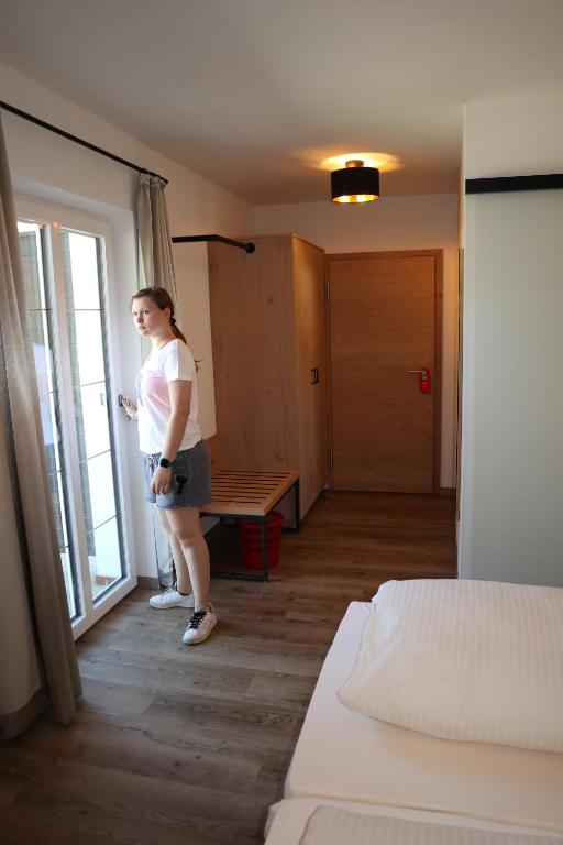 Postel nebo postele na pokoji v ubytování Gasthof Hotel zur Post