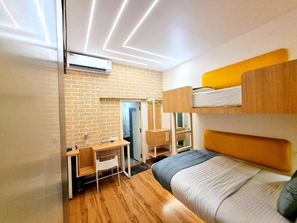 Postel nebo postele na pokoji v ubytování Stay Inn