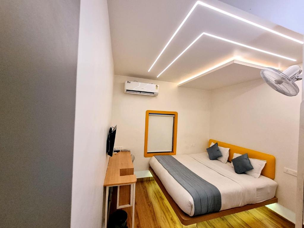Postel nebo postele na pokoji v ubytování Stay Inn
