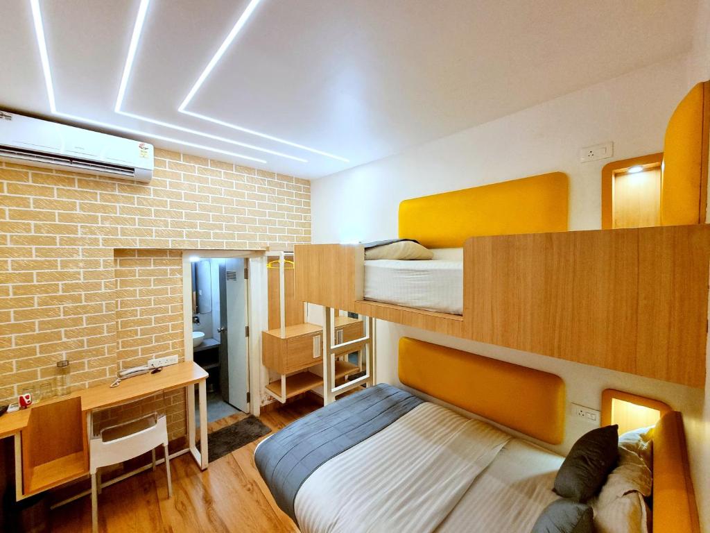 Postel nebo postele na pokoji v ubytování Stay Inn