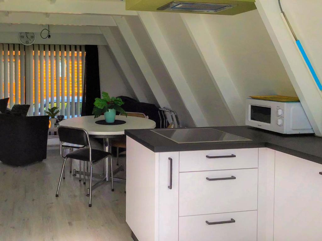 Kuchyň nebo kuchyňský kout v ubytování Chalet Dunepark, Oostduinkerke