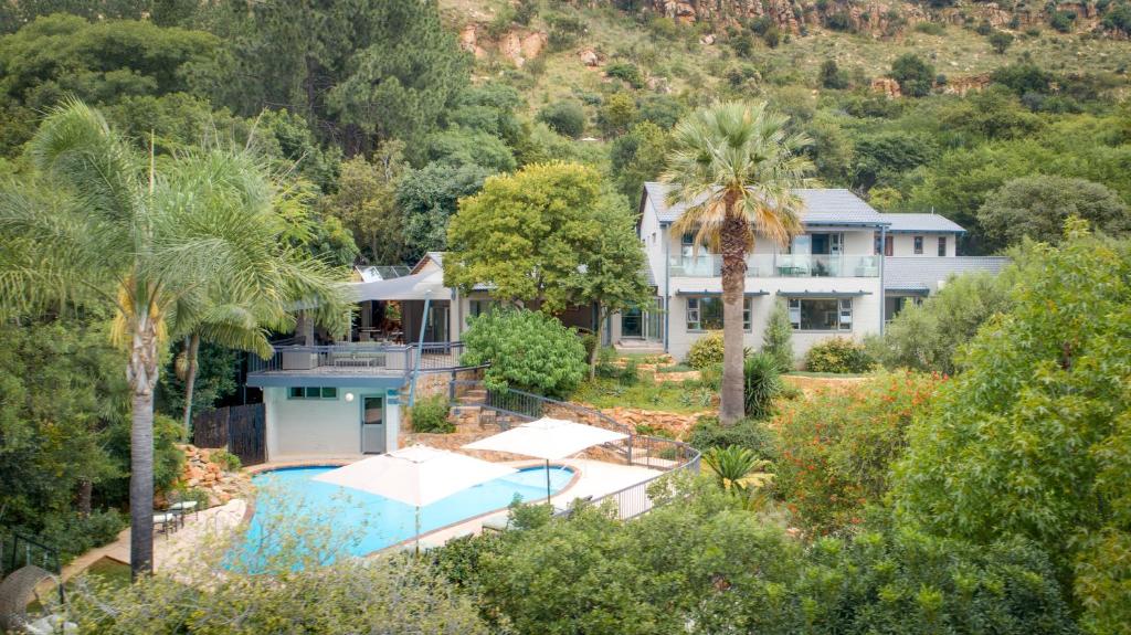 an aerial view of a house with a swimming pool at The Cliffside Boutique Getaway in Johannesburg