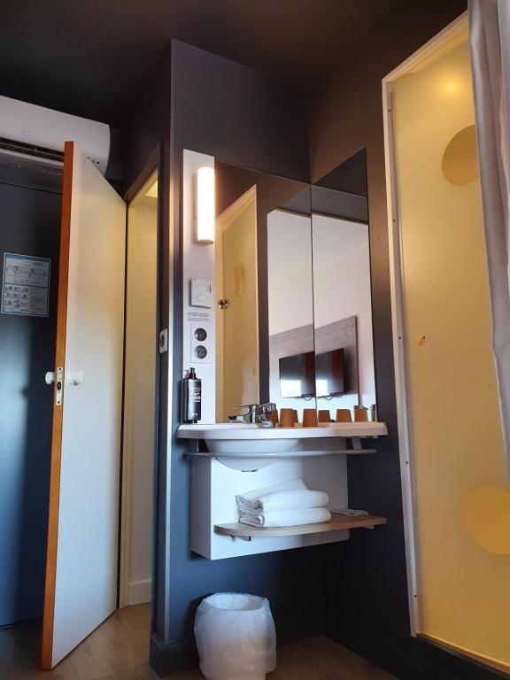 Kuchyň nebo kuchyňský kout v ubytování ibis budget Coutances