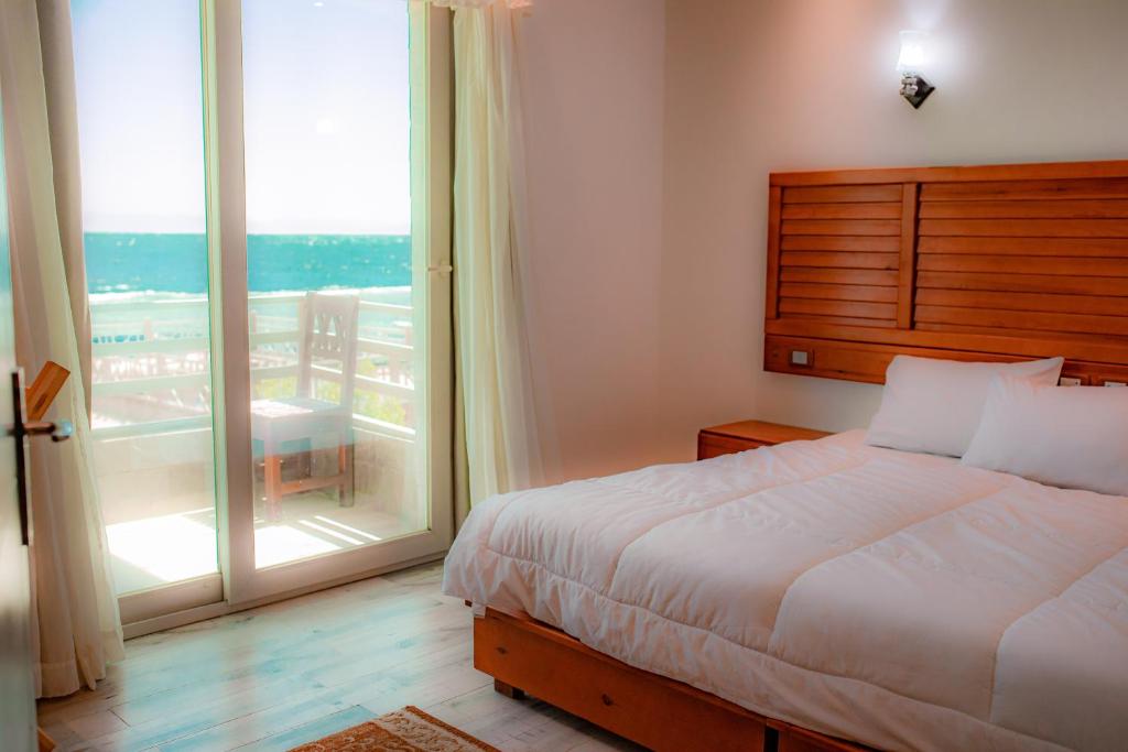 Postel nebo postele na pokoji v ubytování Diamond Dahab House