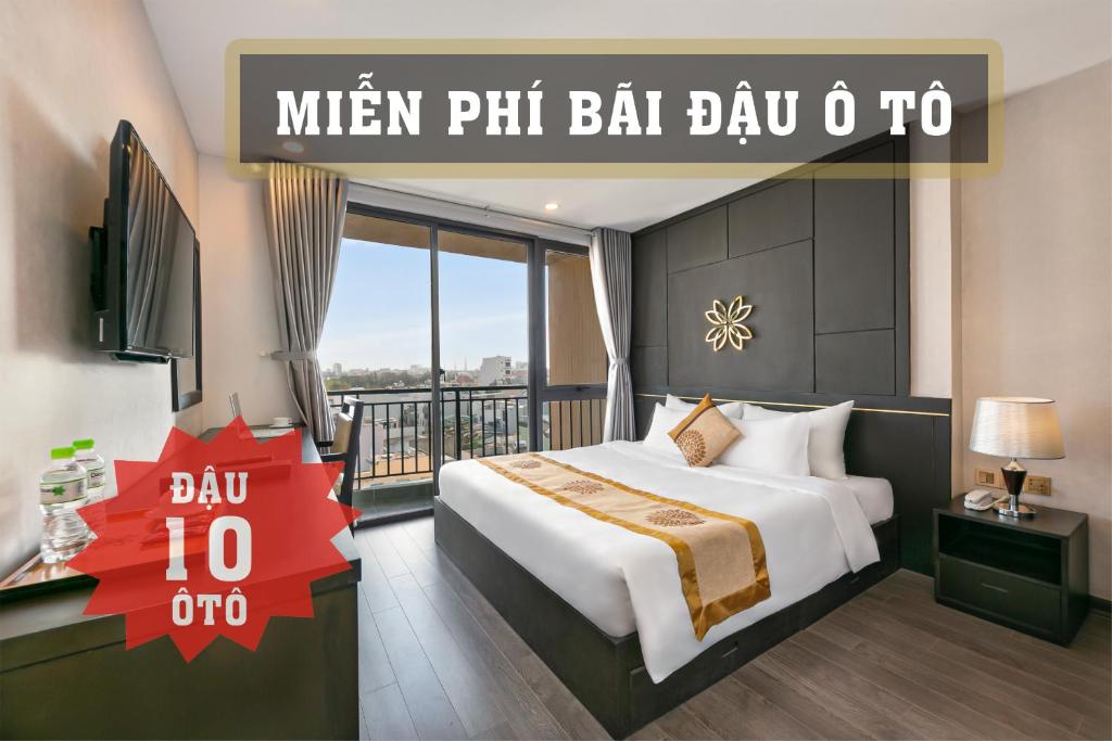 Postel nebo postele na pokoji v ubytování Hanami Hotel Danang