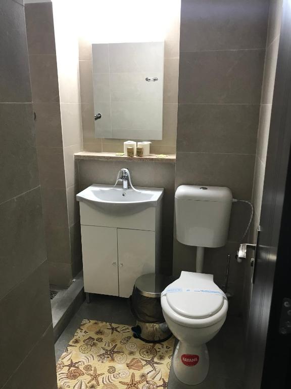 Koupelna v ubytování Hotel Lebăda