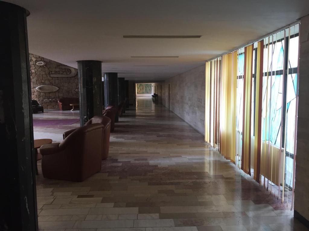Postel nebo postele na pokoji v ubytování Hotel Lebăda