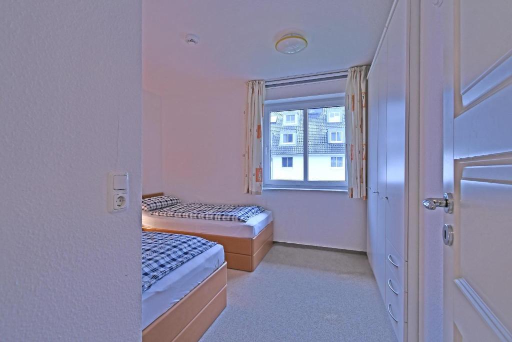 Postel nebo postele na pokoji v ubytování BER-511-Appartementresidenz