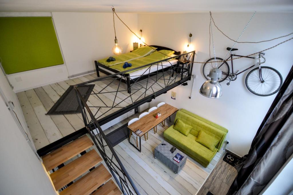 an overhead view of a room with a bike hanging from a ceiling at Altitude Loft in Sarajevo