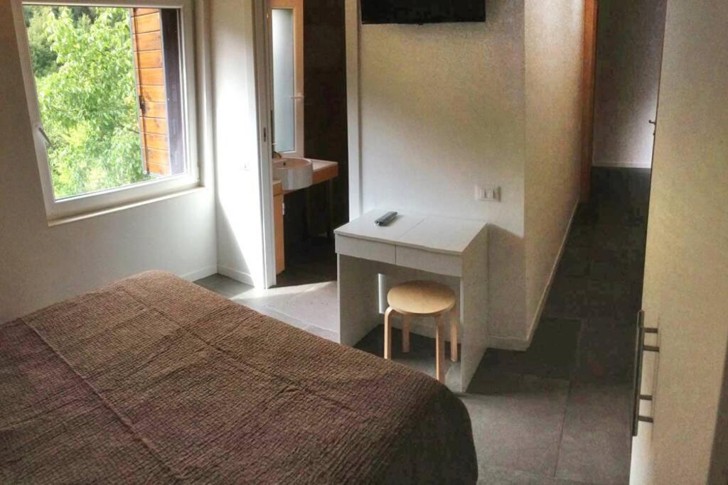 Postel nebo postele na pokoji v ubytování Rifugio del Gran Sasso