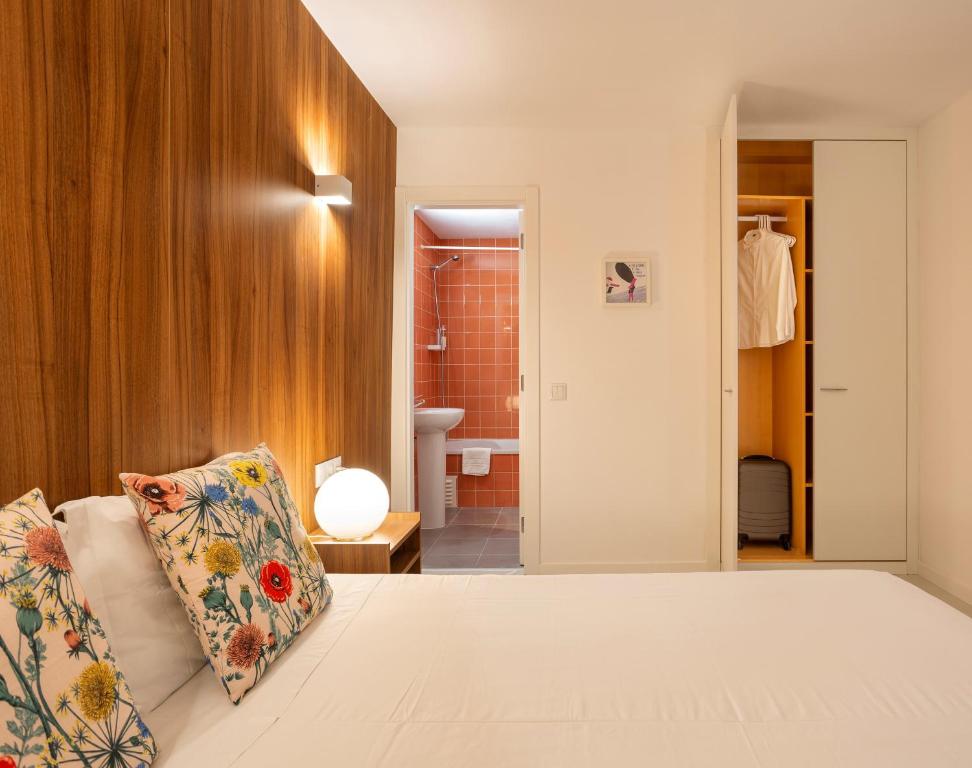 Posteľ alebo postele v izbe v ubytovaní Next Inn