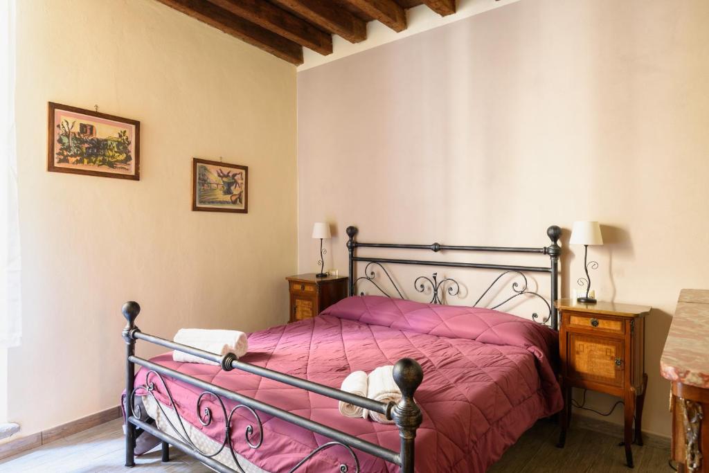 En eller flere senge i et værelse på Pinzochere PT