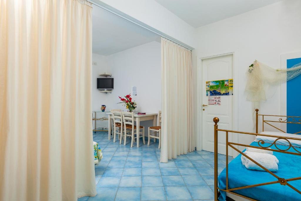 A television and/or entertainment centre at Residenza Gennaro
