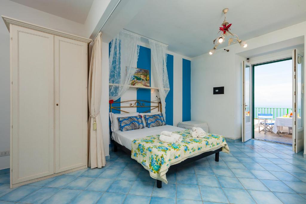 A bed or beds in a room at Residenza Gennaro