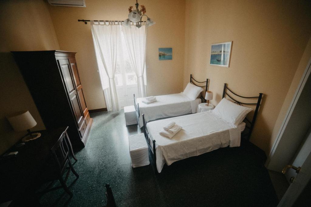 Letto o letti in una camera di Piazza Argento