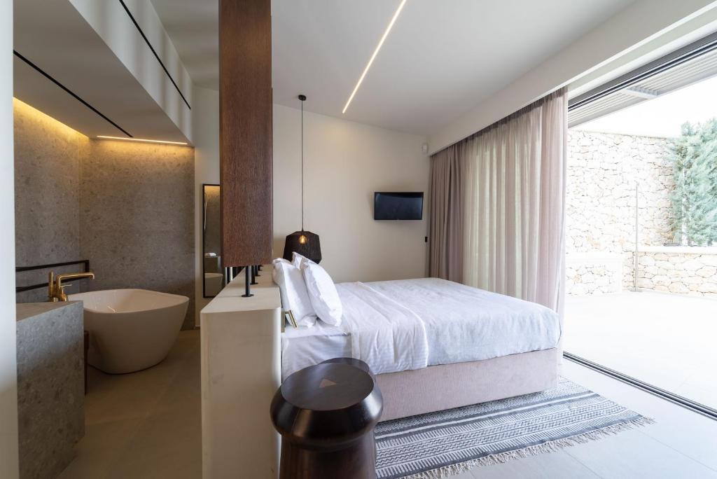 Posteľ alebo postele v izbe v ubytovaní THE WAVE GRANDE VILLA KATHISMA Lefkada