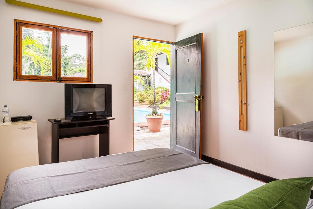 Postel nebo postele na pokoji v ubytování Hotel Premium Real
