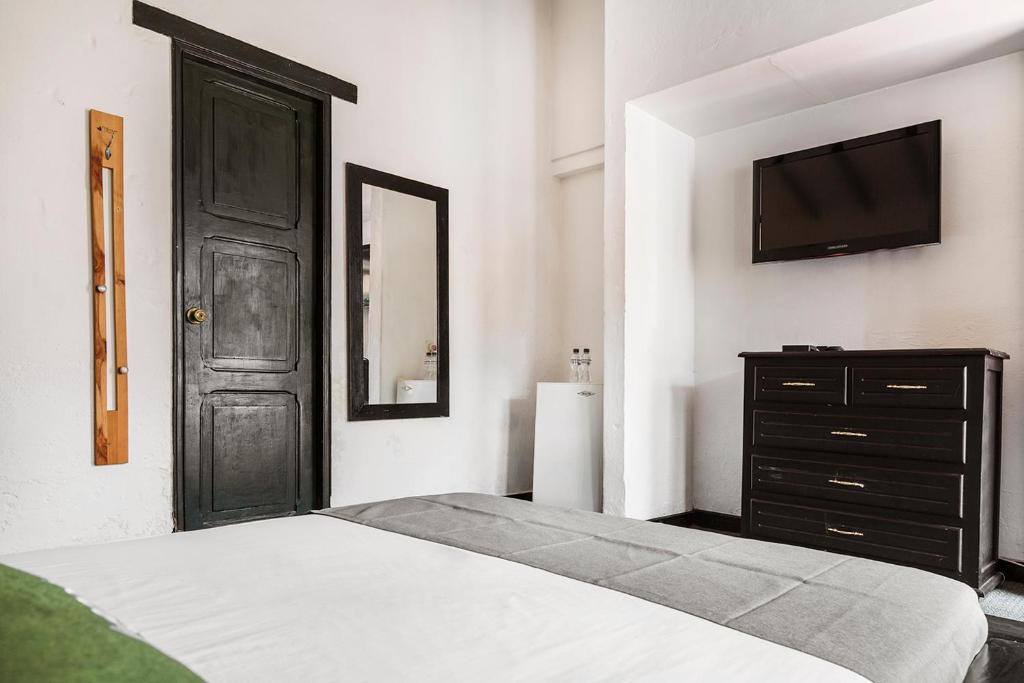Postel nebo postele na pokoji v ubytování Hotel Premium Real