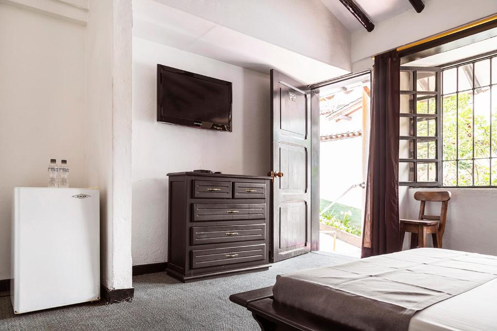 Postel nebo postele na pokoji v ubytování Hotel Premium Real