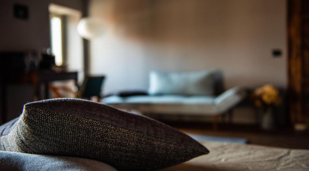Postel nebo postele na pokoji v ubytování Boutique Hotel Al Palazzo Rosso