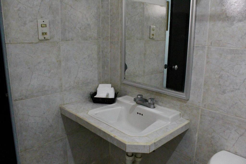 Koupelna v ubytování Hotel El Cid